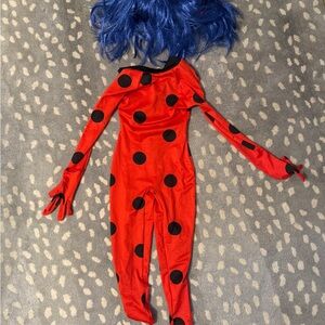 Red and Black Superhero Costume with Polka Dots